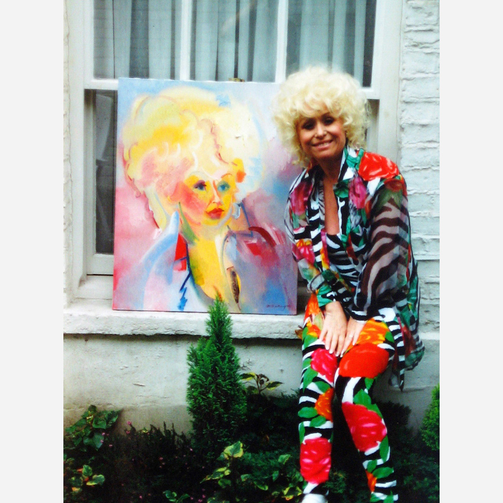 Barbara Windsor at home in 1992 with her Stephen B. Whatley portrait