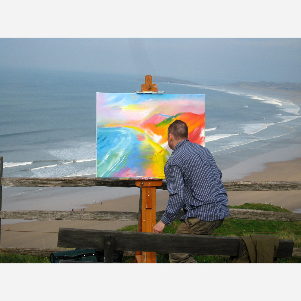Stephen B. Whatley undertaking a commission of Rhossili Bay, S. Wales - 2011