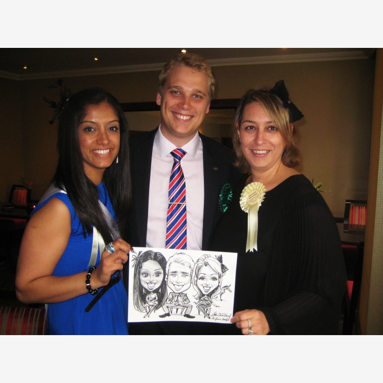 Delighted guests with their Kind Cartoons by Stephen B. Whatley - created on the spot at Cavendish Hotel, London SW1- June 2013